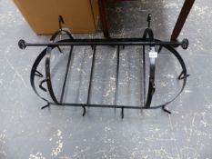 A WROUGHT IRON GAME HANGER.