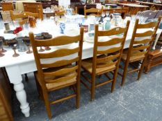 A SET OF SIX GOOD QUALITY RUSH SEAT LADDER BACK DINING CHAIRS.