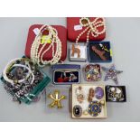 A COLLECTION OF VARIOUS COSTUME JEWELLERY TO INCLUDE BROOCHES, NECKLACES, CUFFLINKS, PEARLS, ETC.