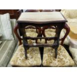 AN EDWARDIAN ORGAN STOOL AND A SMALL PINE CORNER CUPBOARD.