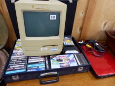 A MACINTOSH COMPUTER AND A DELL LAPTOP.