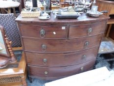 A LATE GEORGIAN MAHOGANY BOW FRONT CHEST OF DRAWERS.