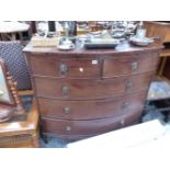 A LATE GEORGIAN MAHOGANY BOW FRONT CHEST OF DRAWERS.