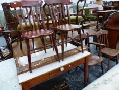 A VICTORIAN PINE KITCHEN TABLE, FOUR KITCHEN CHAIRS INC. AN OXFORD ARM CHAIR AND A COPPER FENDER.