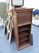 A TAMBOUR FRONTED FILING CABINET.