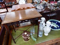 A SMALL MAHOGANY OCCASIONAL TABLE AND A WALL SHELF.