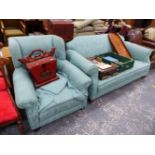 A TWO SEATER SOFA AND A SIMILAR WINGED BACK ARMCHAIR.