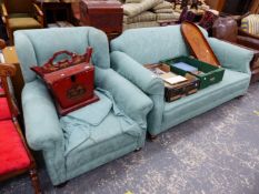 A TWO SEATER SOFA AND A SIMILAR WINGED BACK ARMCHAIR.