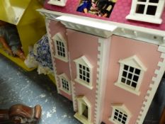 TWO DOLLS HOUSES.