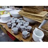 A QUANTITY OF NEW AND UNUSED HOMEWARE PLATES, CUPS, ETC.