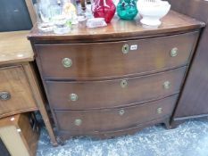 AN ANTIQUE THREE DRAWER BOW FRONT CHEST OF DRAWERS.