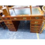 A CAMPAIGN STYLE TWIN PEDESTAL WRITING DESK.