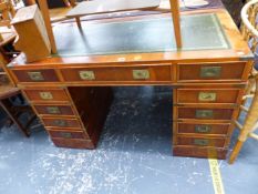 A CAMPAIGN STYLE TWIN PEDESTAL WRITING DESK.