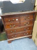 AN ANTIQUE MAHOGANY CONVERTED COMMODE.