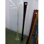 A PAIR OF TALL GLASS VASES.