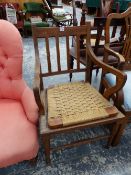 AN UNUSUAL EDWARDIAN ARM CHAIR.