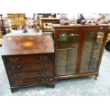 A REPRODUCTION MAHOGANY BUREAU TOGETHER WITH A MAHOGANY DISPLAY CABINET.