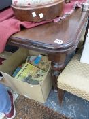 A VICTORIAN MAHOGANY EXTENDING DINING TABLE.