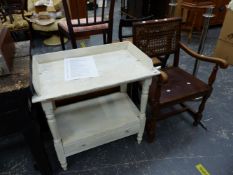 A SMALL PAINTED WASH STAND, AND A CANE BACK ARMCHAIR.