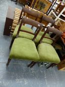 A SET OF FOUR GEORGE III MAHOGANY DINING CHAIRS.