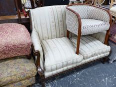 A FRENCH STYLE CARVED WALNUT SHOW FRAME SALON SETTEE.