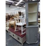 A PAINTED THREE DRAWER OTTOMAN, A ROCKING CHAIR, AND A PAINTED CORNER CABINET.