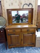 A SMALL ARTS AND CRAFTS STYLE OAK MIRROR BACK SIDEBOARD.