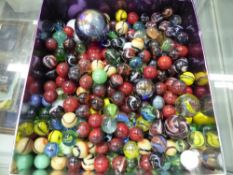 A BOX OF MARBLES.