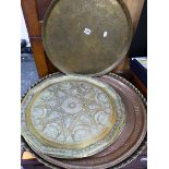 FIVE DECORATED MIDDLE EASTERN BRASS AND COPPER TRAYS.