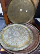 FIVE DECORATED MIDDLE EASTERN BRASS AND COPPER TRAYS.