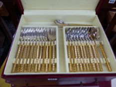 A PART SET OF HENRI JEAN FRANCOIS GOLD PLATED CUTLERY.