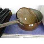 A LARGE COPPER SAUCEPAN.