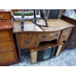 A SMALL EDWARDIAN MAHOGANY SERPENTINE SIDE BOARD.