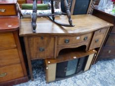 A SMALL EDWARDIAN MAHOGANY SERPENTINE SIDE BOARD.