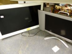 TWO FLAT SCREEN TVS.