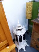 A CAST IRON CONSERVATORY HEATER AND A CANDLE STAND.