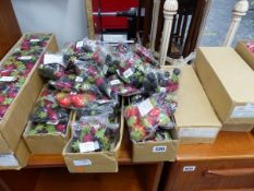 A QUANTITY OF FAUX STRAWBERRIES AND OTHER FRUITS.