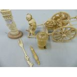 AN ORIENTAL CARVED IVORY FIGURE GROUP OF A FARMER PULLING A CART WITH CHILD AND BASKET OF