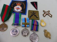A BOX OF VARIOUS MEDALS INC. NORTHERN IRELAND SERVICE MEDAL, AND BRITISH FORCES GERMANY MEDAL.