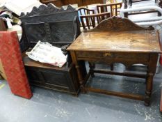 AN ANTIQUE OAK BOX SEAT SETTLE AND A SIMILAR SIDE TABLE.