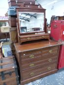 AN EDWARDIAN WALNUT DRESSING CHEST.