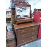 AN EDWARDIAN WALNUT DRESSING CHEST.