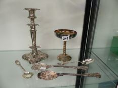 TWO SILVER ORNATE SOUP SPOONS, A PAIR OF PLATED BERRY SPOONS, A PLATED CANDLESTICK, AND A SPANISH