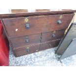 AN 18th C. OAK CHEST OF DRAWERS.