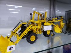 A LEGO TECHNIC DIGGER.