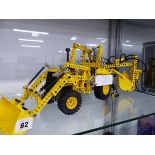 A LEGO TECHNIC DIGGER.