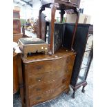 A WALNUT SERPENTINE CHEST OF DRAWERS, A SIDE TABLE AND A STOOL.