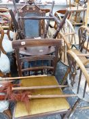 A VICTORIAN CARVED OAK HIGH BACK CHAIR AND THREE OTHERS.