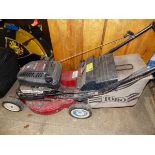 A TORO PETROL LAWN MOWER.