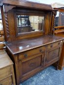 A 1920'S OAK SIDEBOARD.